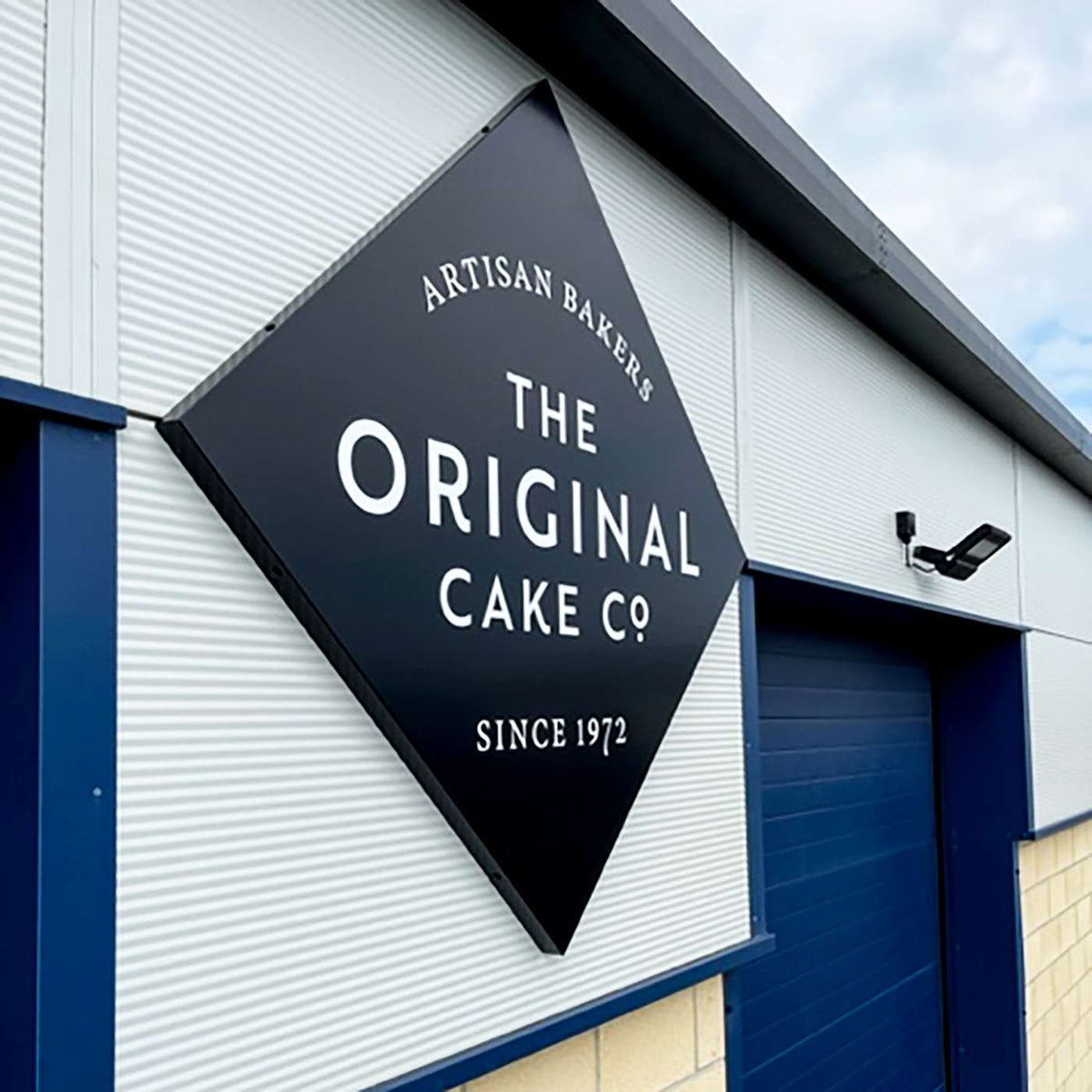 Bakery sign on an industrial building, from the MetaGuard UV-700 gallery.