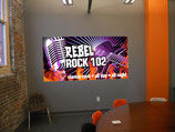 REBEL ROCK 102 promotional wall graphic; representative RB528P application, not the exact sale roll, width or finish.