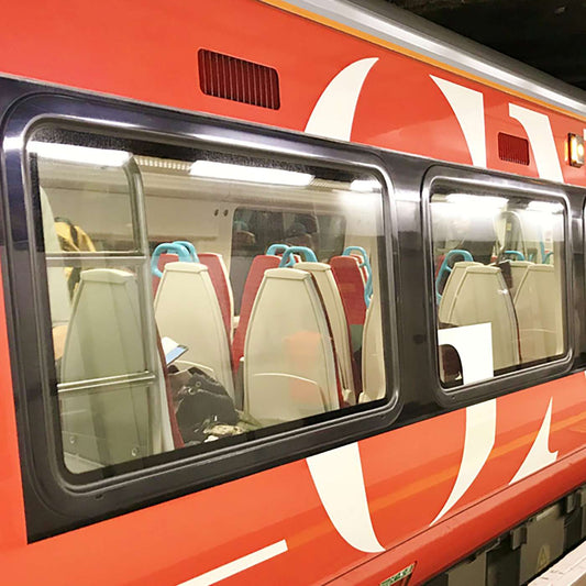 Graphics along a passenger-train side, from the MetaGuard MG-850RW gallery.