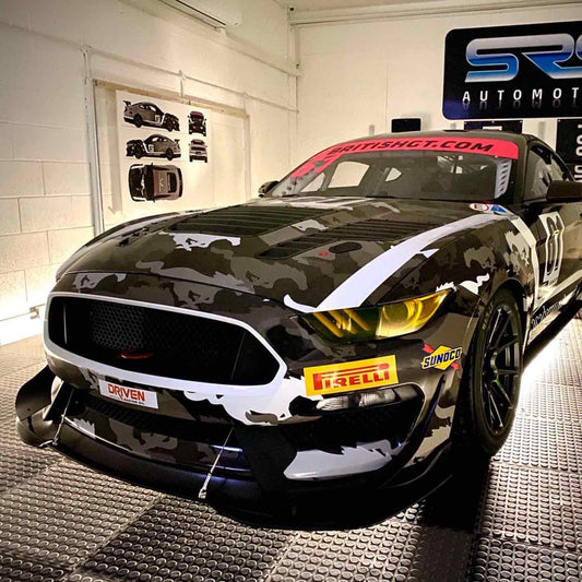 Patterned vehicle graphics on a race car, from the MetaCast MDC manufacturer gallery.
