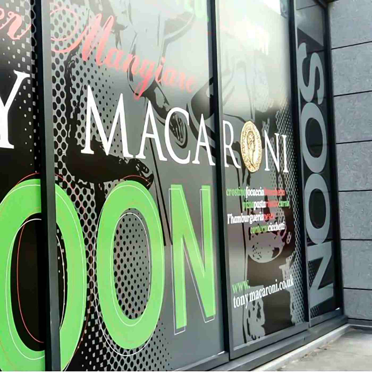 Storefront window graphics with restaurant lettering, from the Metamark MDP-R gallery.