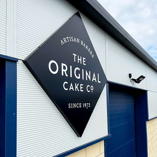 Bakery sign on an industrial building, from the MetaGuard UV-700 gallery.