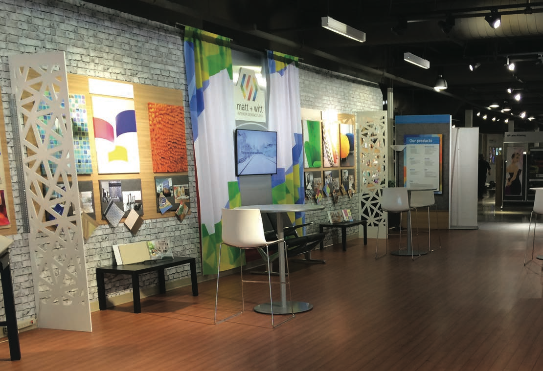 HP Graphics Experience Center display area; representative project using PF6300 and other materials, exact laminate in each area unidentified.